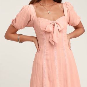 LULU’s blush pink Madeline dress with puff sleeves, underwire, and lace details